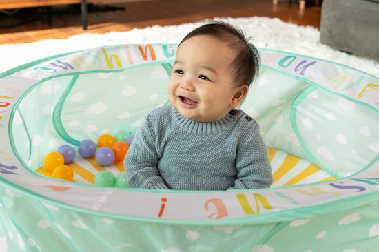 Shop Baby City's Infantino Pop Up Ball Pit Gym