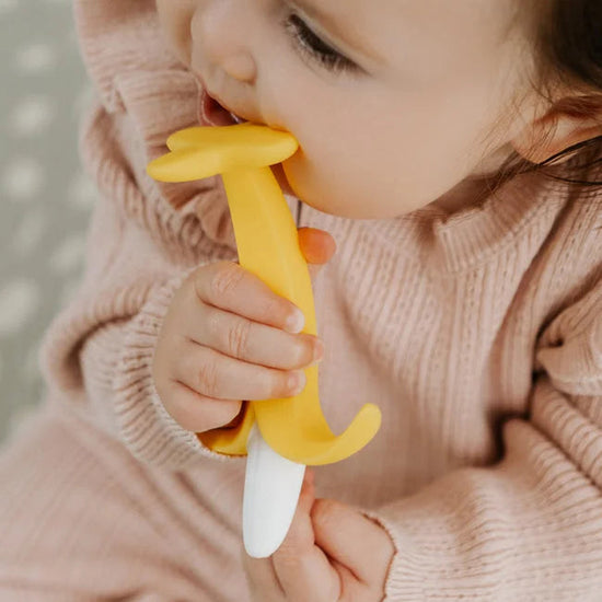 Nuby Banana Shaped Silicone Teether l Baby City UK Retailer