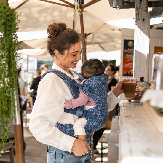 Infantino Flip 4-in-1 Convertible Baby Carrier Navy Floral at The Baby City Store