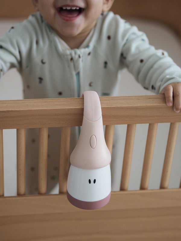 Baby City Stockist of Béaba Pixie Torch 2-in-1 Portable Night Light - Chalk Pink